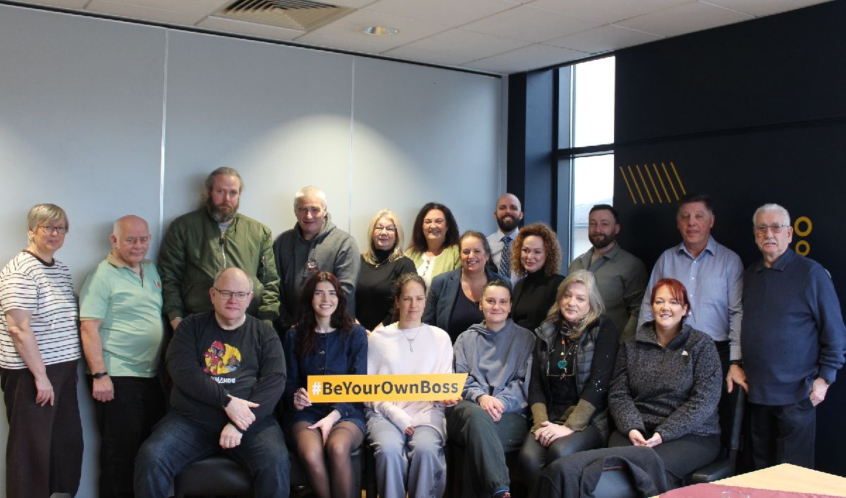 A group of students, guests and SERC staff at the business breakfast in SERC Downpatrick Campus  College Kitchen